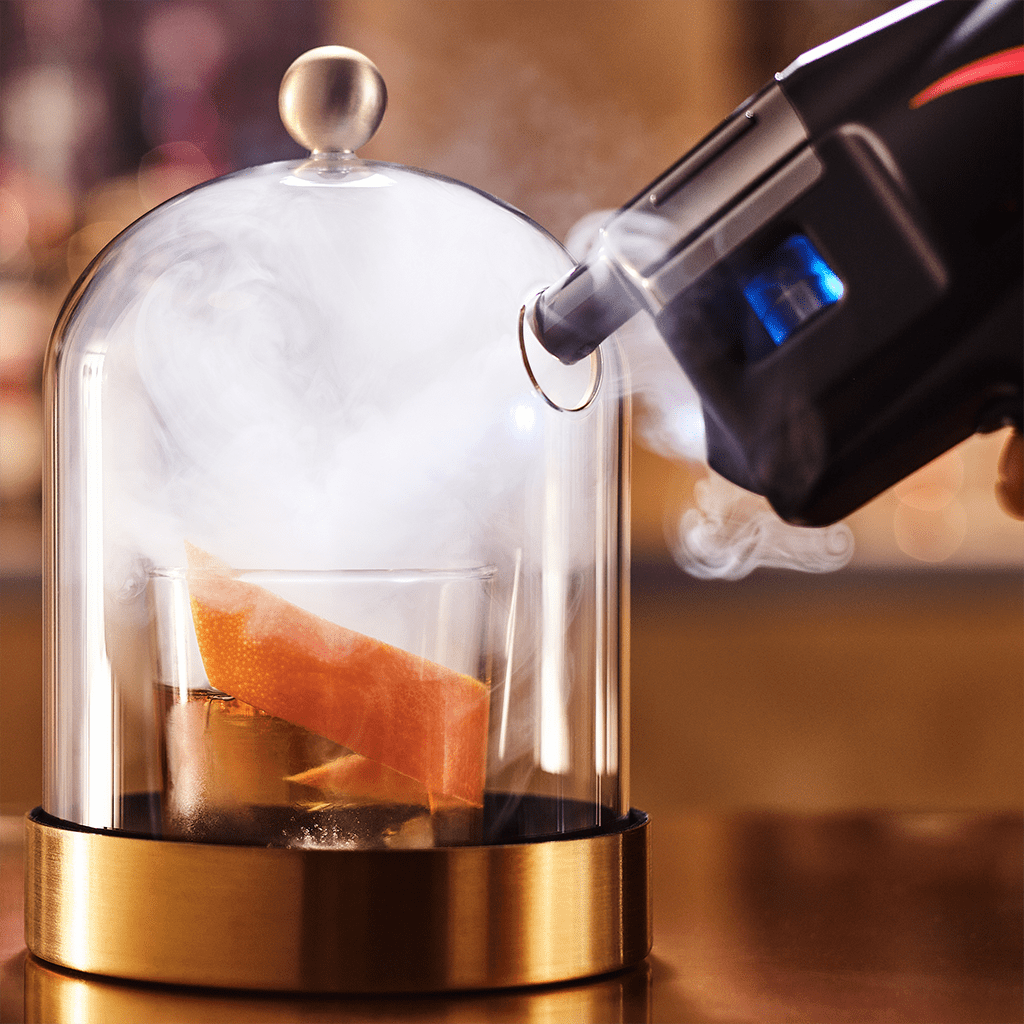 Petite cloche en verre avec socle doré